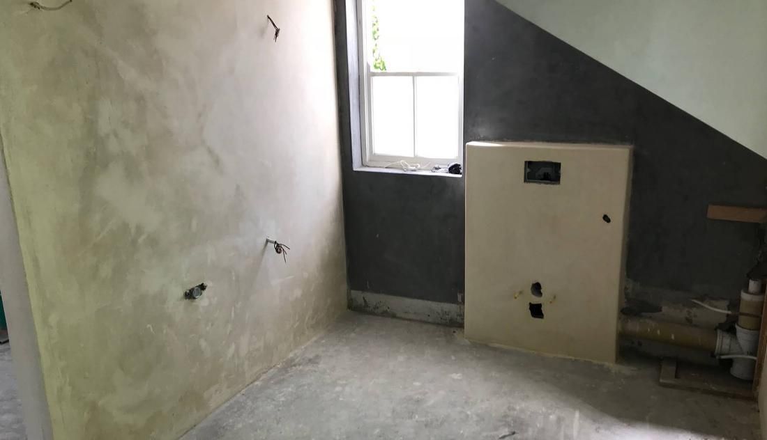 Bathroom under renovation with the cistern boxed in